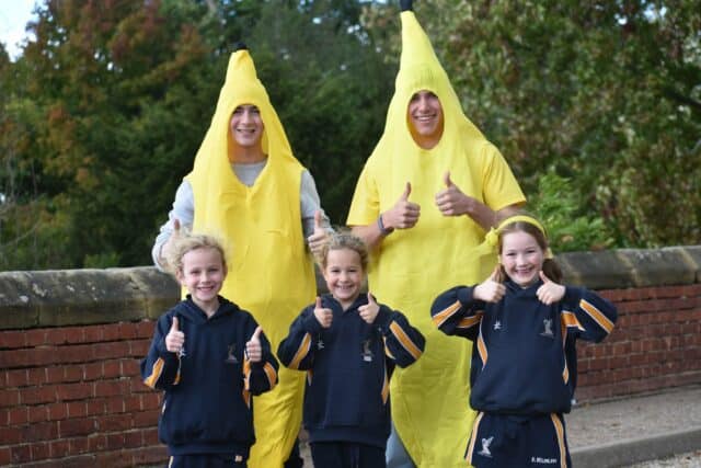 Two students dressed up as banannas on Hello Yellow Mental Health Day